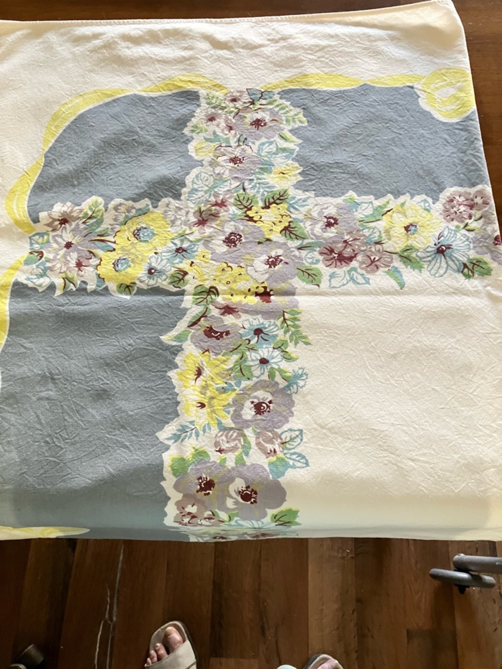 Vintage Tablecloth with White Edge, Yellow Row, and A Floral Pattern. Firm $